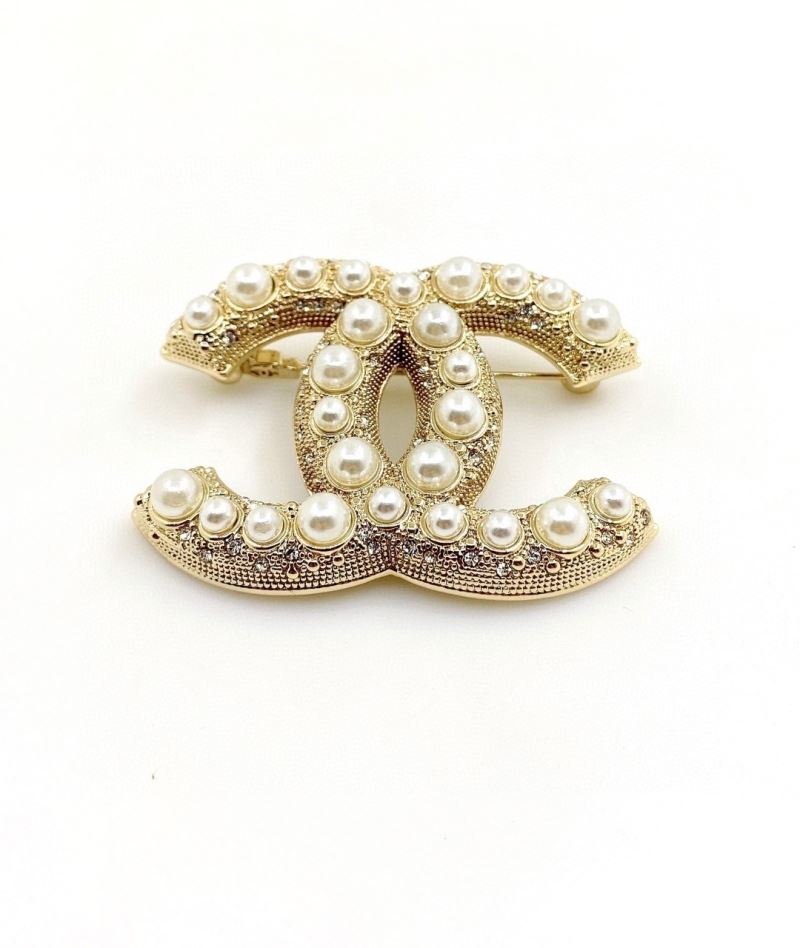 Ch**el brooches